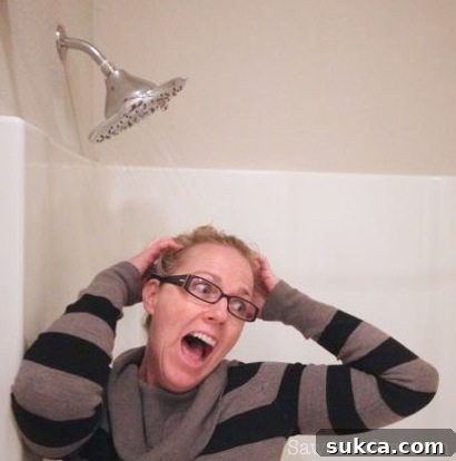 Enjoying the New Shower Enjoying the new shower head, showing improved water flow.