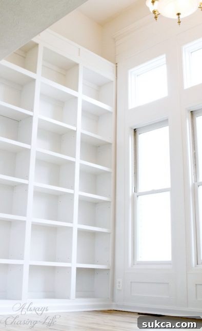 Super tall, built-in bookshelves creating an impressive display