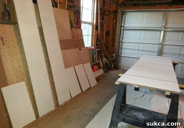 Custom closet wardrobe components laid out for painting