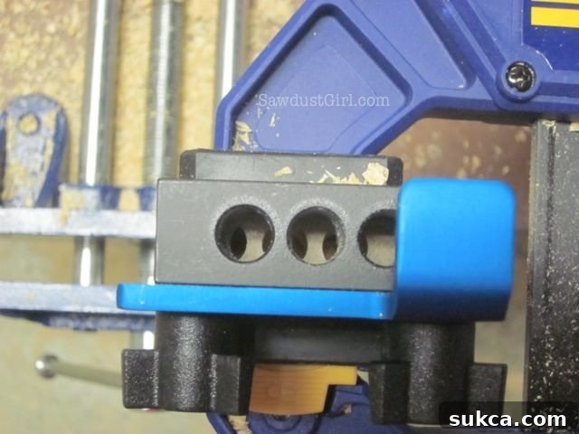 Sliding the Beadlock jig to position B for the second set of holes
