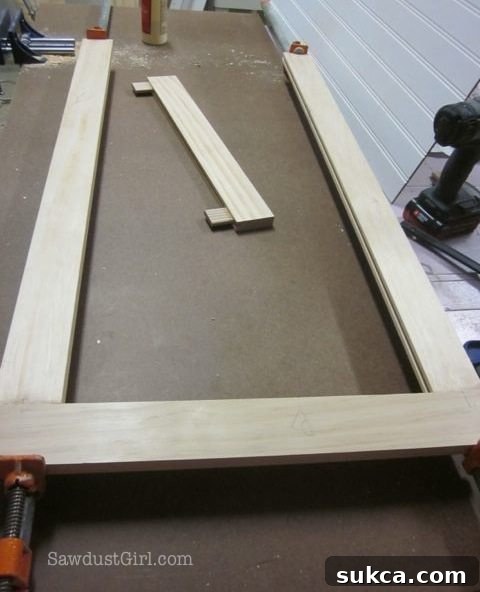 Assembling cabinet door frame by gluing three parts, leaving space for panel