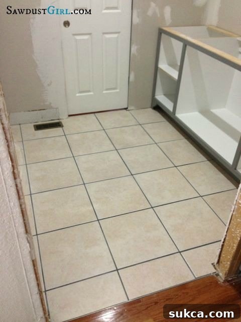 Cleaned tile and grout after successful paint removal, sparkling surface