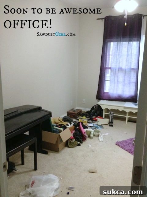 Empty room before renovation, showcasing bare walls and flooring, indicating a clean slate for a new office design.
