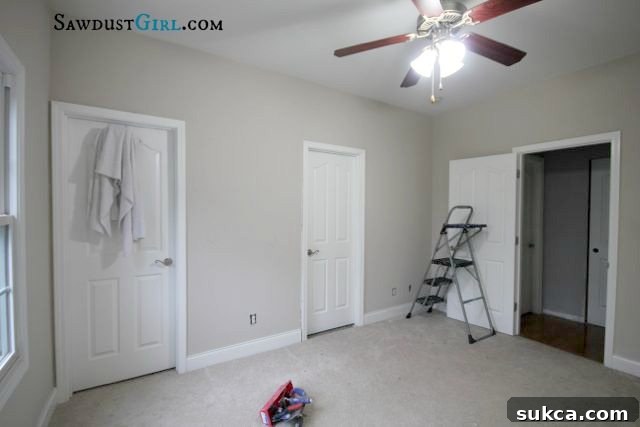 Corner perspective of the empty room, showing wall-to-wall possibilities for a custom home office design.