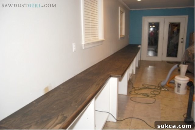 The stunning ebony-stained oak plywood countertop Beautifully stained oak plywood countertops in ebony finish, awaiting polyurethane