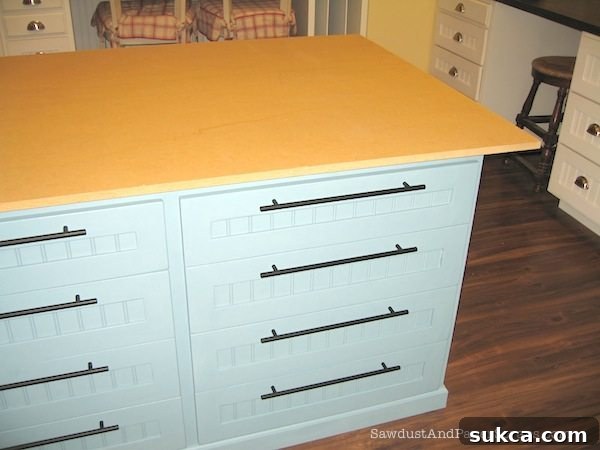 MDF core pieces laid out on cabinets ready for lamination