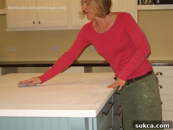 Primed and partially painted MDF countertop showing smooth finish