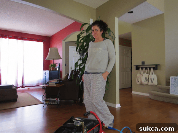 Val working on built-in buffet project in comfortable Sawdust Girl attire