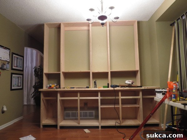 Val's custom 'fiver' bookcase design for the dining room buffet