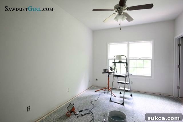 Office walls after meticulous skim coating, sanding, and priming, showcasing a pristine, smooth finish ready for paint.