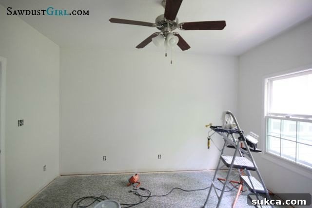 Primed walls in the designated double office space, meticulously prepared and awaiting the installation of the innovative modular custom furniture system.