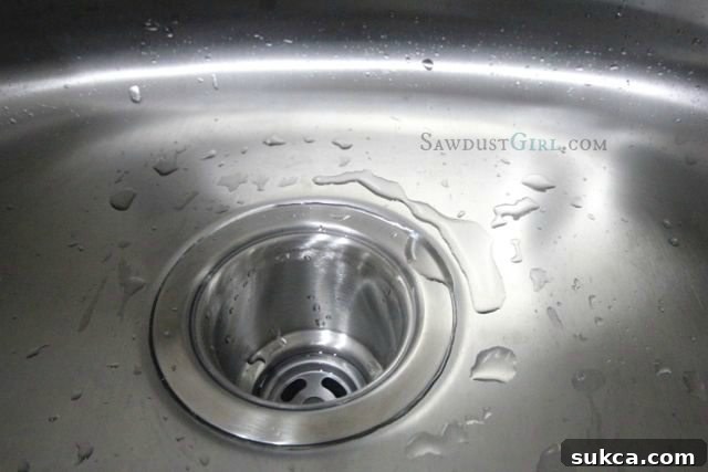 Stainless steel undermount sink in laundry room