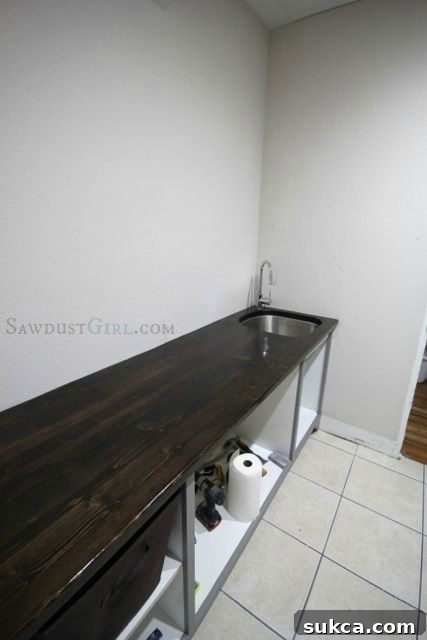 DIY wood countertops in laundry room, showing natural wood grain