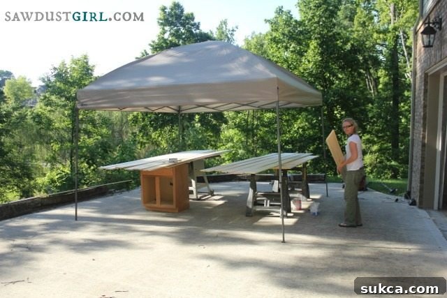 Outdoor Workshop Canopy A newly set up outdoor workshop canopy, ready for creative projects in the shade.