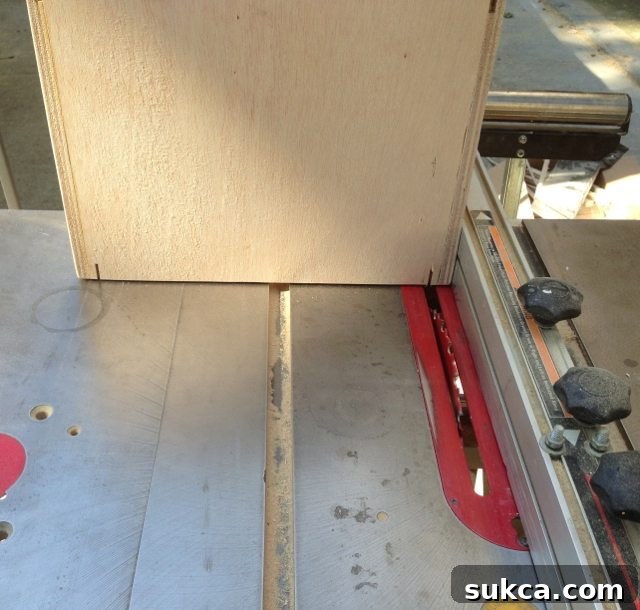 Drawer box with newly cut grooves for hanging file bars, showing the precision of the cuts.