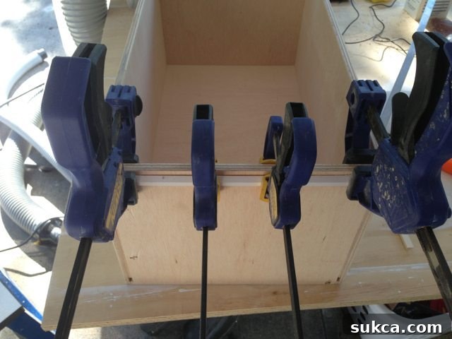 The installed metal hanging file bars securely fitted within the drawer box.