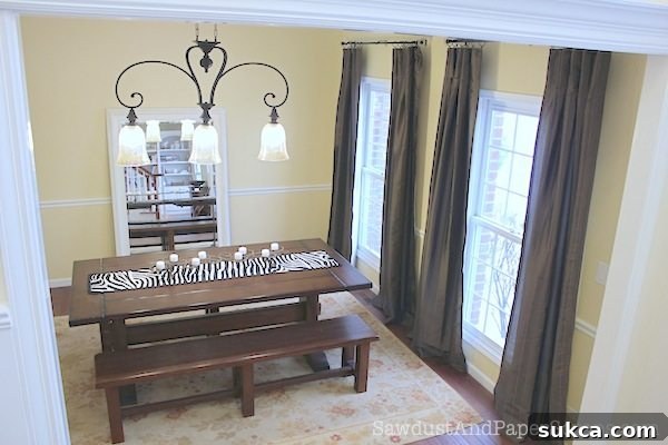 Close-up of dining room decor, featuring stylish chairs and table setting.