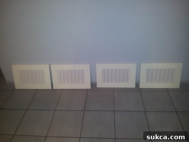 DIY custom cabinet doors nearing completion for a bedroom makeover