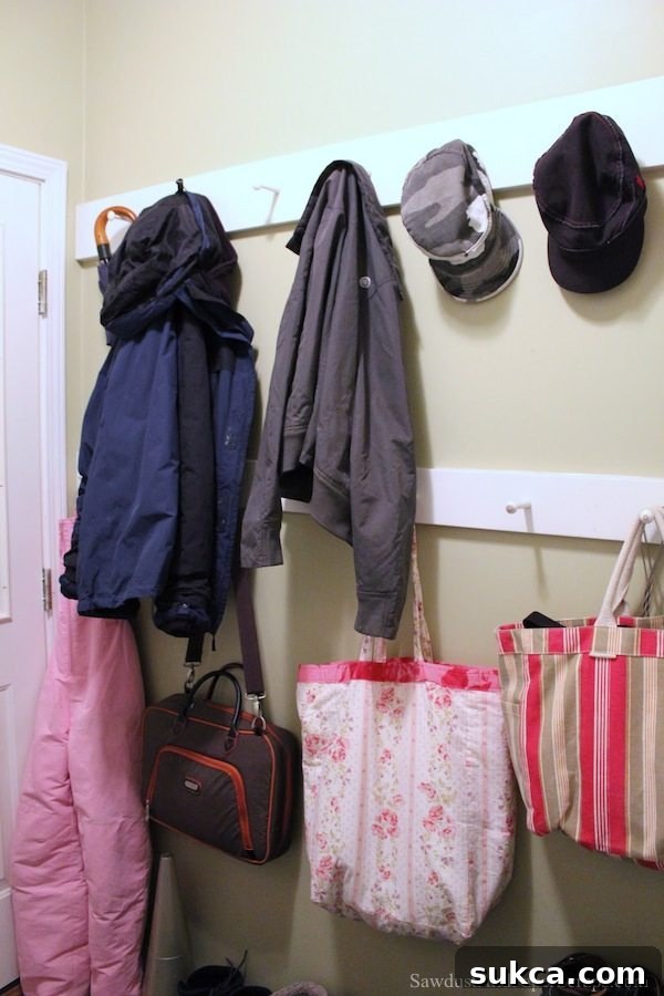 Custom MDF peg boards in a laundry room