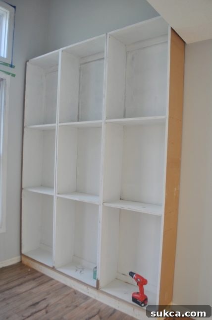Built-in library cabinets taking shape DIY library built-in cabinets installed in place