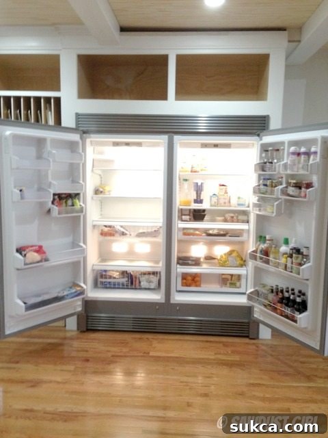 Frigidaire Appliance Duo Exterior shot of sleek Frigidaire fridge and freezer