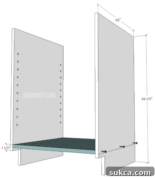 Attaching the bottom panel to the side panels of a kitchen cabinet using wood glue and screws for strong construction.