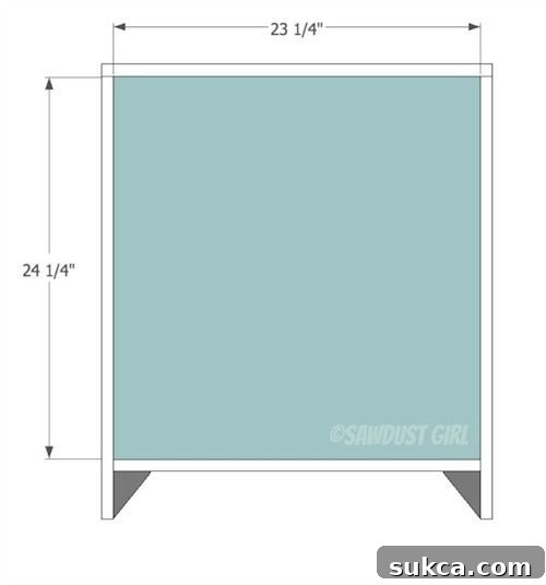 Attaching the 1/2-inch plywood back panel to the cabinet carcass with pocket screws.