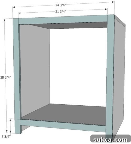 Building and securing the hardwood faceframe to the desk cabinet, showing the assembled frame.