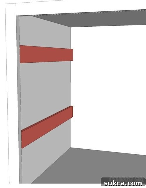 Close-up of drawer glides and cleats installation inside the cabinet, showing precise measurements.