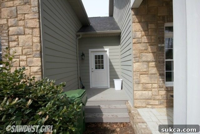 Side view of the new kitchen entrance, emphasizing its clean lines and functional design.