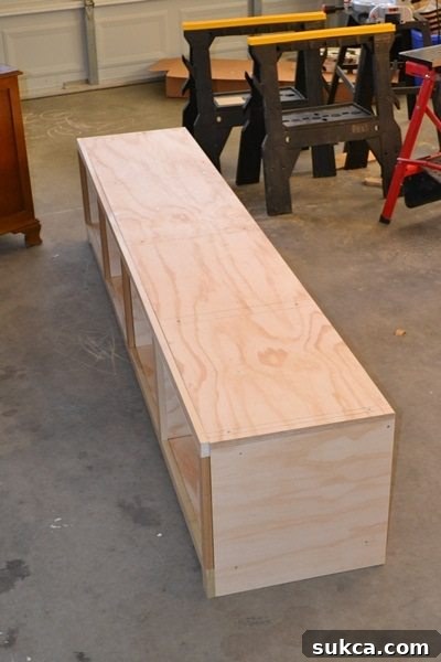 Custom window seat base with cut-out for floor vent