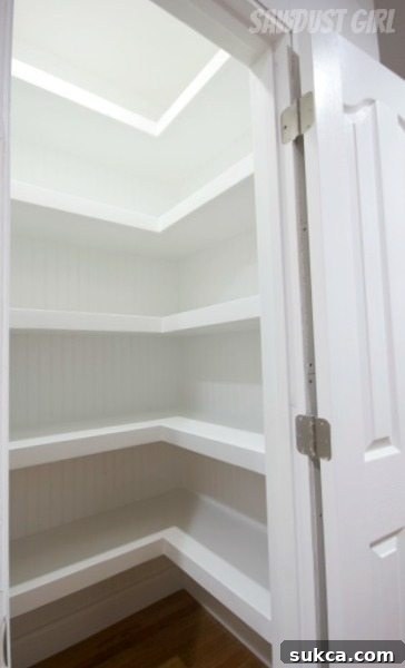 Hall closet with floating shelves