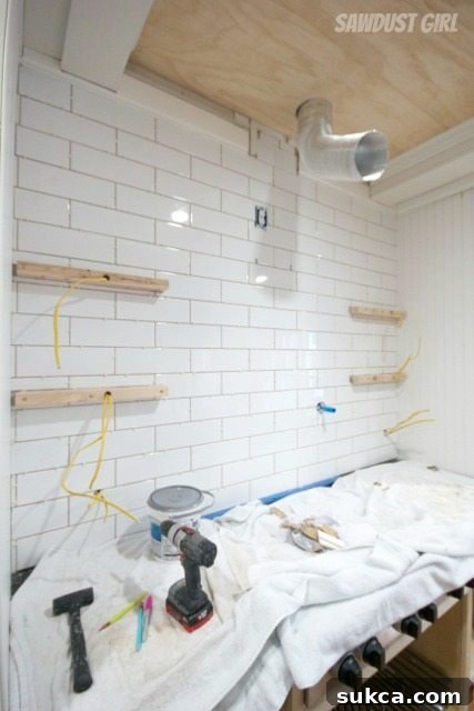 Installed large subway tile backsplash close-up