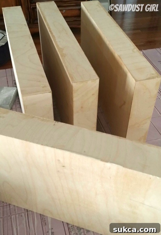 Unfinished Mitered Floating Shelf Unit A fully assembled but unfinished floating shelf unit, ready for the finishing touches