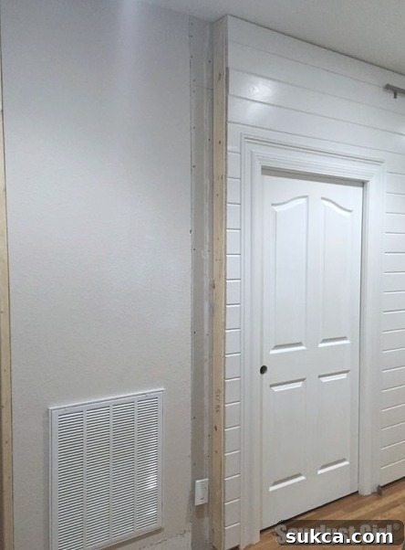Exposed ends of a plank wall section