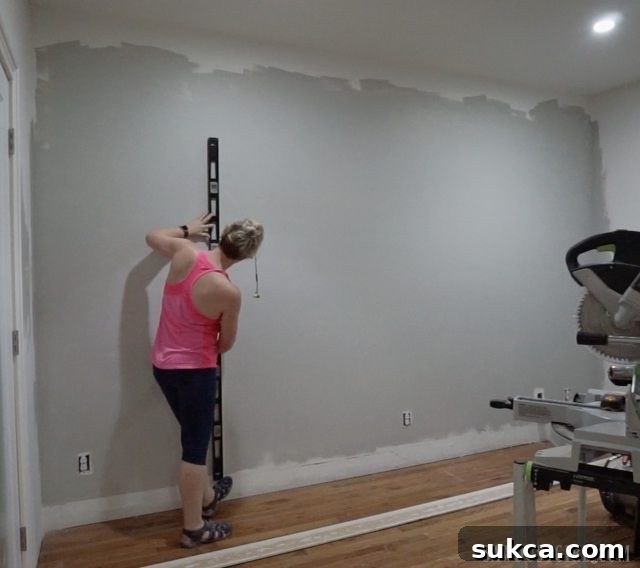 Marking wall studs for plank installation