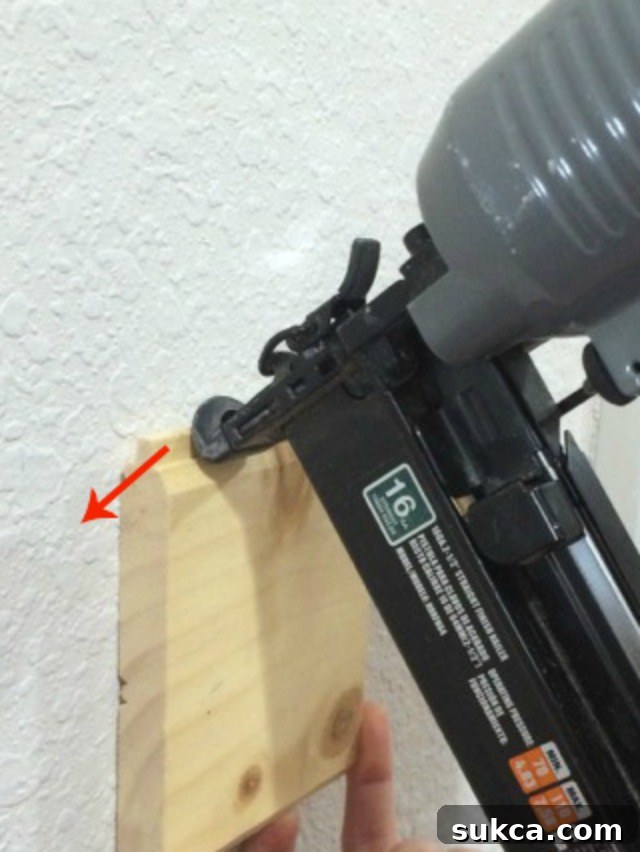 Nailing through the tongue of a plank wall
