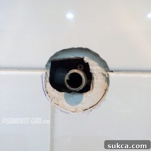 Close-up of the tile with the mark indicating a slight alignment issue Kitchen Pot Filler
