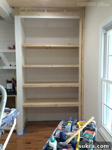 Kitchen pantry framing partially removed for redesign