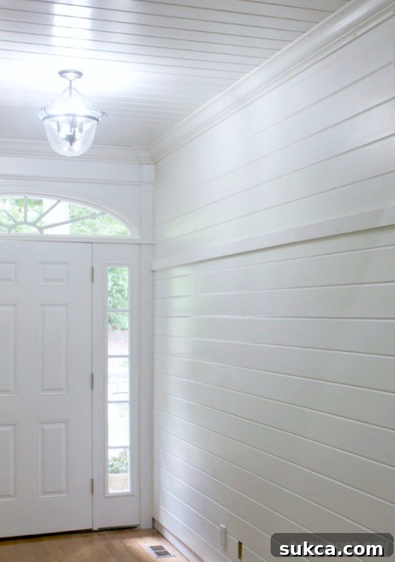 Picture rail installed on wall for attaching DIY Organizer boards