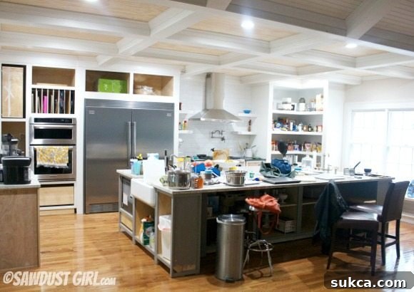 kitchen area with new ceiling structure visible, integrated into the open floor plan