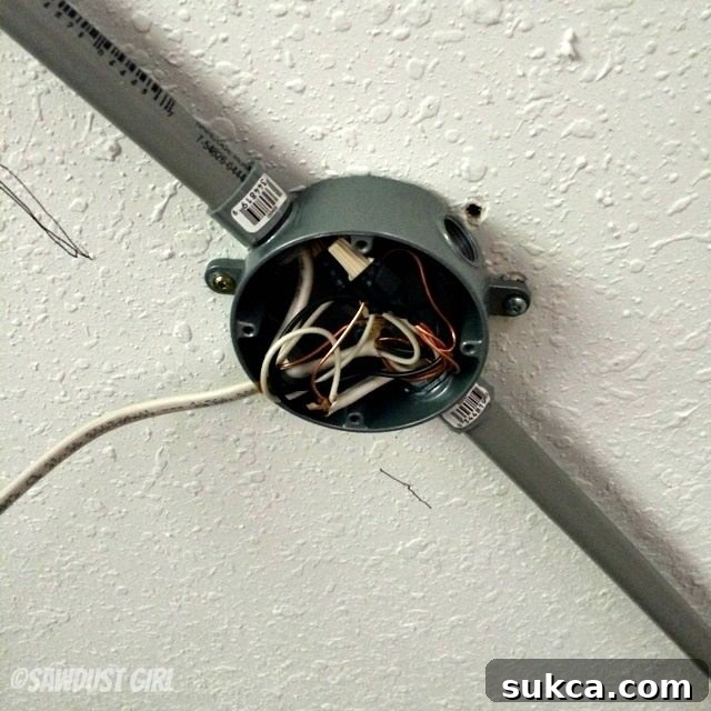 Wiring connections inside the junction box on the ceiling