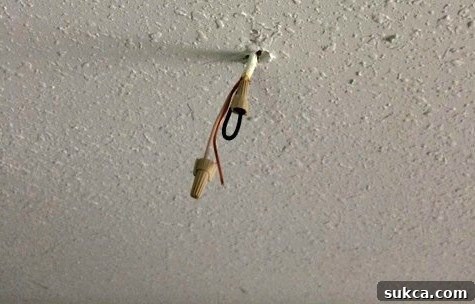 Romex wire exposed after removing old light fixture