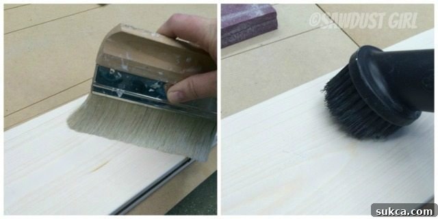 Dust Removal Cleaning sawdust from wood surfaces with a vacuum and brush, preparing for staining.