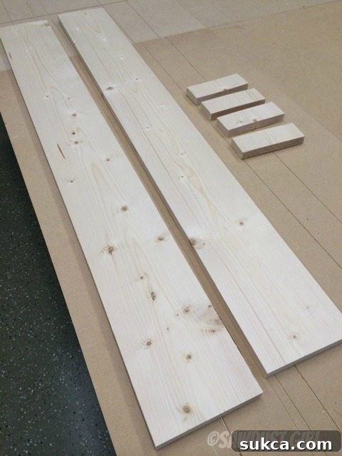 Cutting Main Boards Dividing a long pine board into two equal 44-inch sections for a DIY magazine rack.