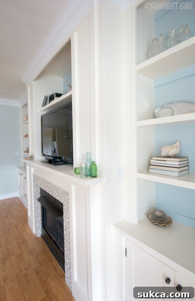 Stunning custom built-in entertainment center and fireplace in a modern living room