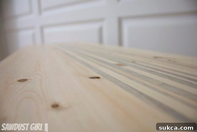 Rustic Contemporary Entry Table Close-up of the striped wood tabletop with Blue Stained Pine accents