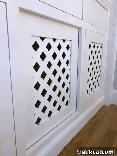 Close-up of the lattice door on a custom built-in dog kennel