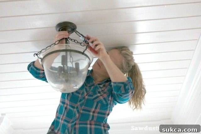 Removing screw caps from an old ceiling light fixture