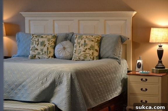 Upcycled White Door Headboard for a Chic Bedroom